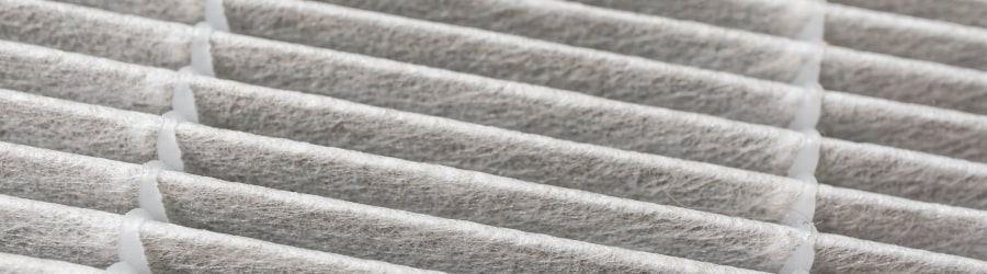 High-efficiency particulate absorber