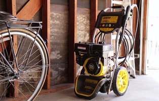 Gas Pressure Washer from Champion on a long-term storage in a garage.